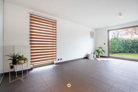 Gelijkvloers 1-slaapkamerappartement met private tuin en garagebox - Baron van Ertbornstraat 15, Aartselaar - Te huur via De Woonmakelaar
