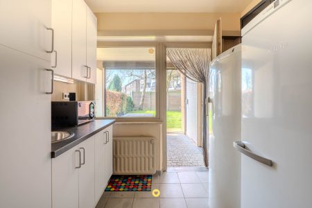 Bel-etage met 3 slaapkamers, tuin en ruime garage in een rustige buurt - IJzermaalberg 40, Kontich - Te koop via De Woonmakelaar