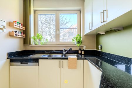 Bel-etage met 3 slaapkamers, tuin en ruime garage in een rustige buurt - IJzermaalberg 40, Kontich - Te koop via De Woonmakelaar